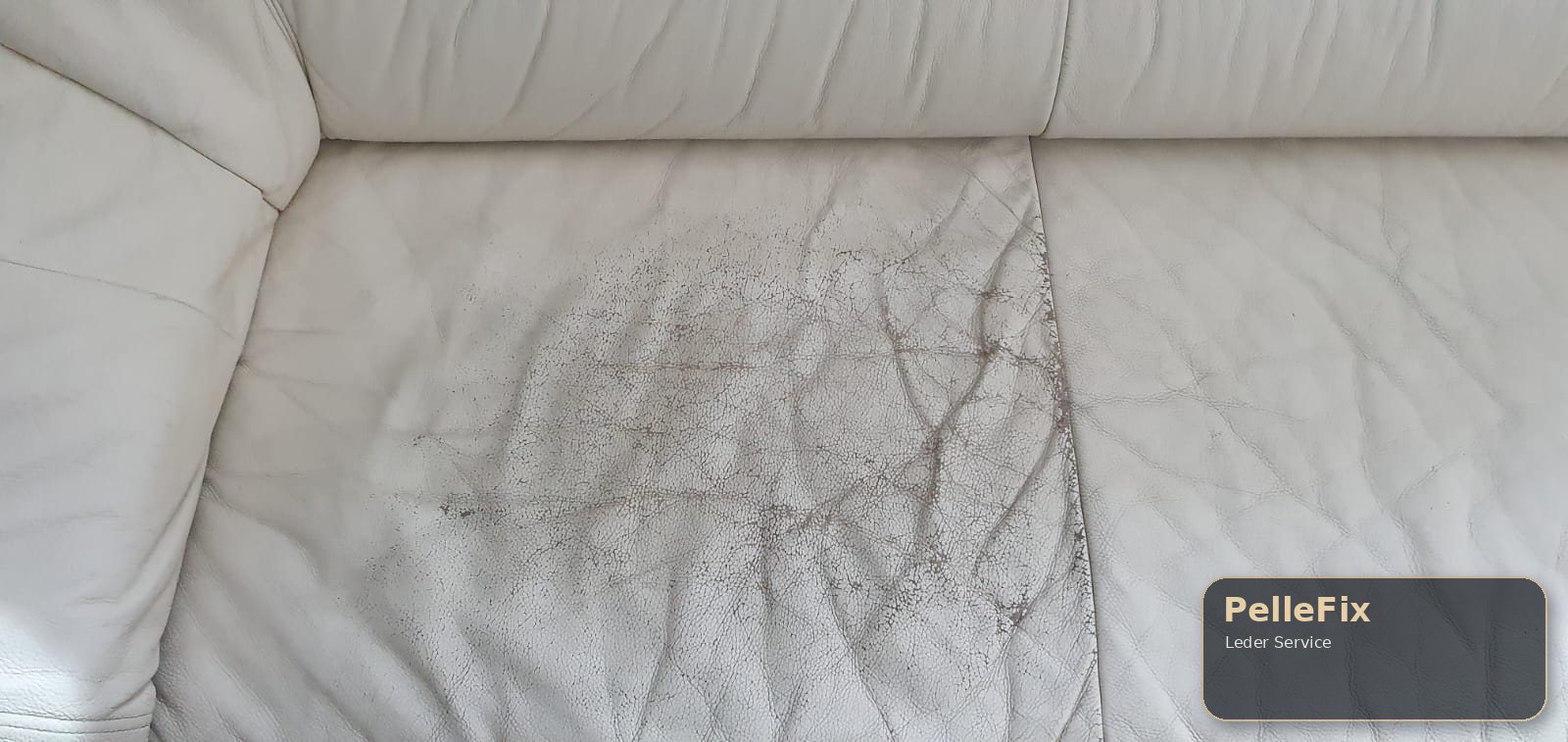 Beschädigte helle Lederfläche als Beispiel für ein Schadensbild